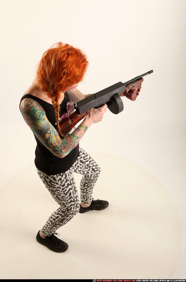 Woman Adult Athletic White Fighting with submachine gun Standing poses Casual