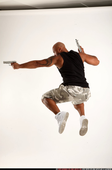 Man Adult Athletic Black Fighting with gun Moving poses Sportswear