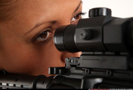 Woman Adult Athletic White Fighting with submachine gun Standing poses Casual