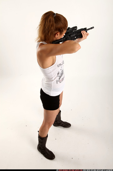 Woman Adult Athletic White Fighting with submachine gun Standing poses Casual