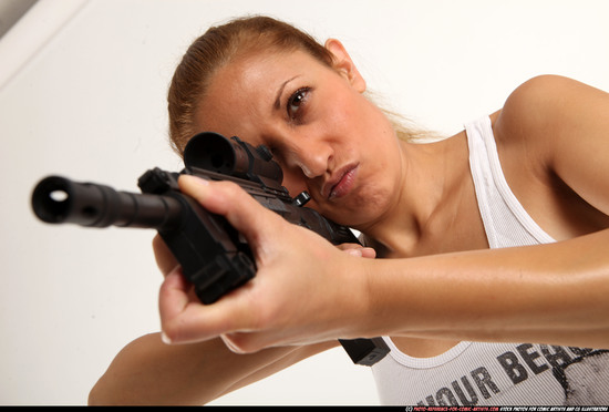 Woman Adult Athletic White Fighting with submachine gun Standing poses Casual