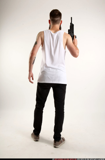 Man Adult Athletic White Fighting with submachine gun Standing poses Casual