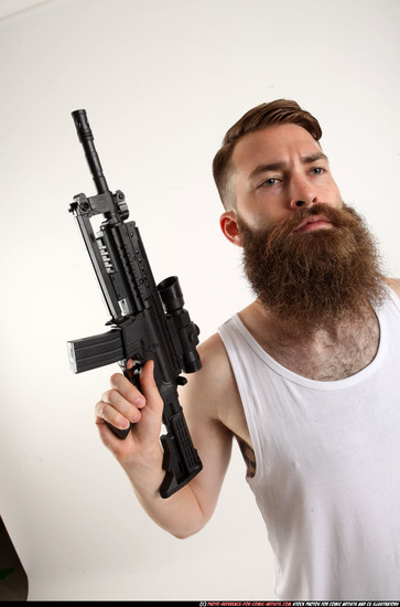 Man Adult Athletic White Fighting with submachine gun Standing poses Casual