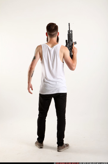 Man Adult Athletic White Fighting with submachine gun Standing poses Casual