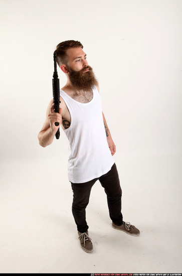 Man Adult Athletic White Fighting with submachine gun Standing poses Casual