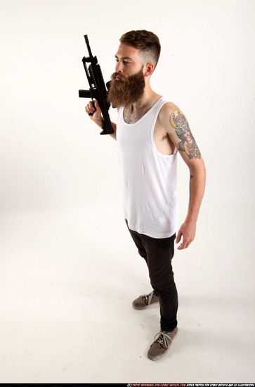 Man Adult Athletic White Fighting with submachine gun Standing poses Casual