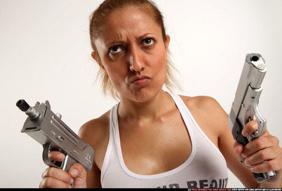 Woman Adult Athletic White Fighting with gun Kneeling poses Casual