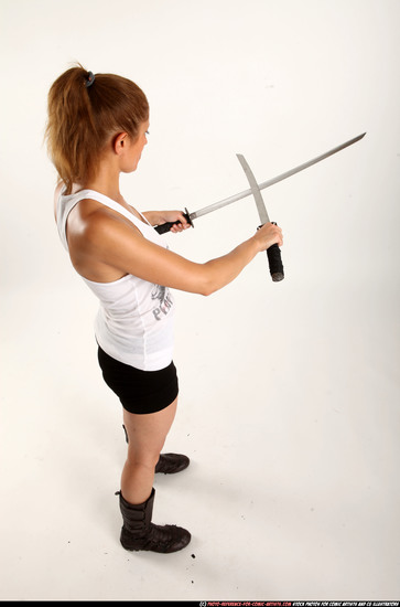 Woman Adult Athletic White Fighting with sword Standing poses Casual