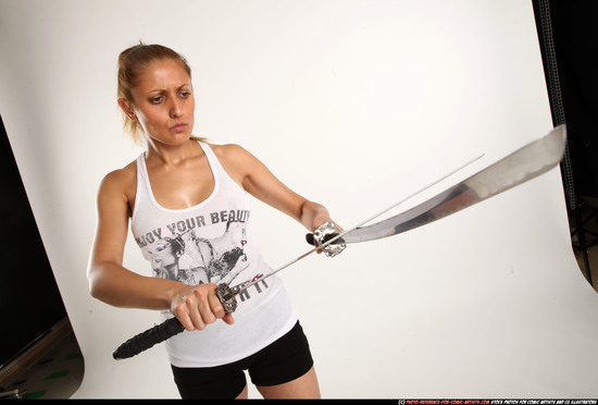 Woman Adult Athletic White Fighting with sword Standing poses Casual