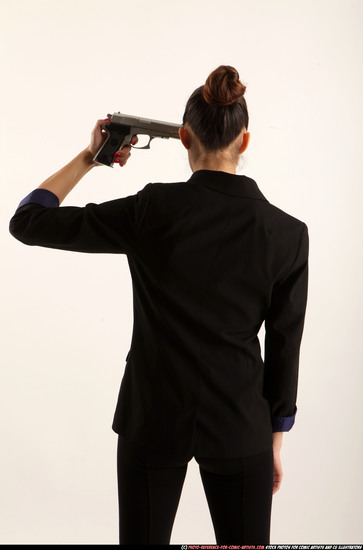 Woman Young Athletic White Fighting with gun Standing poses Business