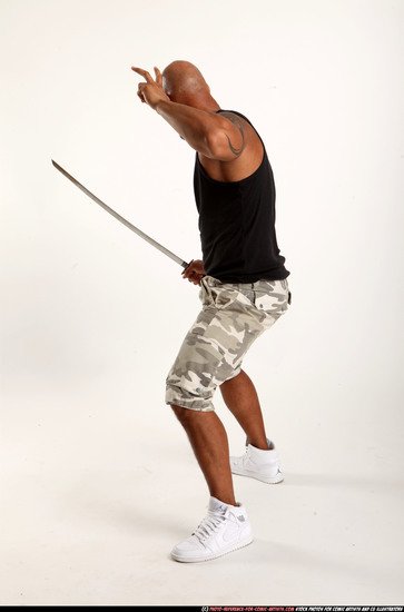 Man Adult Athletic Black Fighting with sword Standing poses Army