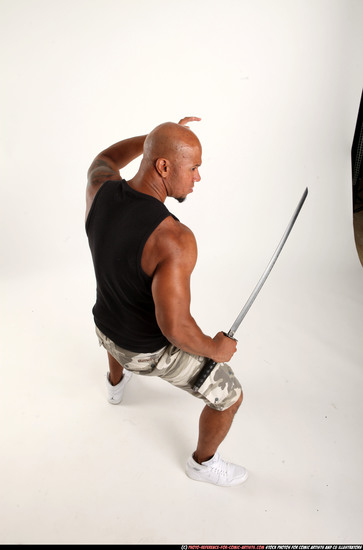 Man Adult Athletic Black Fighting with sword Standing poses Army