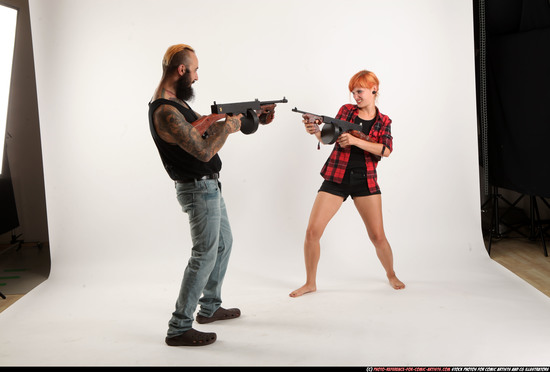 Man & Woman Adult Athletic White Fighting with submachine gun Standing poses Casual