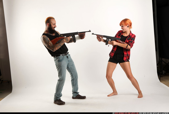 Man & Woman Adult Athletic White Fighting with submachine gun Standing poses Casual