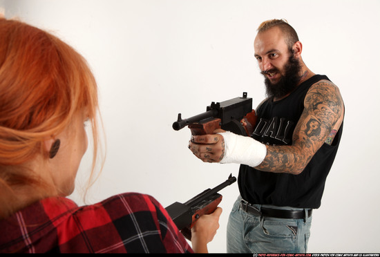 Man & Woman Adult Athletic White Fighting with submachine gun Standing poses Casual