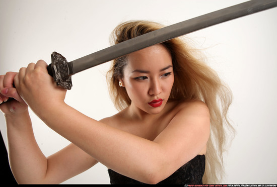 Woman Young Average Fighting with sword Standing poses Casual Asian