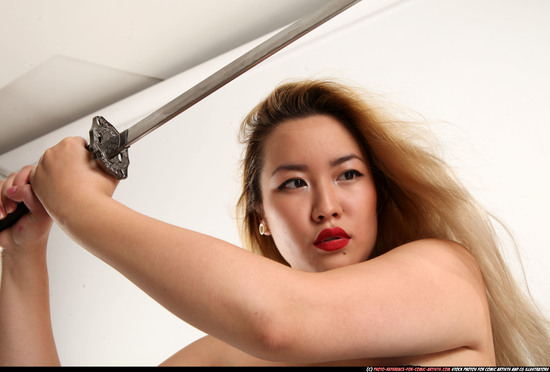 Woman Young Average Fighting with sword Standing poses Casual Asian