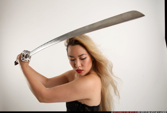 Woman Young Average Fighting with sword Standing poses Casual Asian