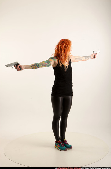 Woman Adult Athletic White Fighting with gun Standing poses Casual