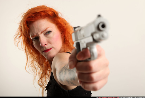 Woman Adult Athletic White Fighting with gun Standing poses Casual