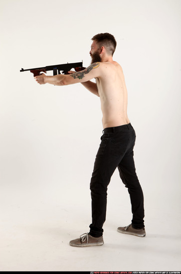 Man Adult Athletic White Fighting with submachine gun Standing poses Pants