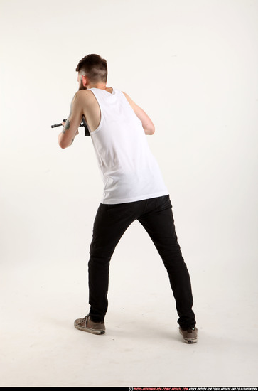 Man Adult Athletic White Fighting with submachine gun Standing poses Casual