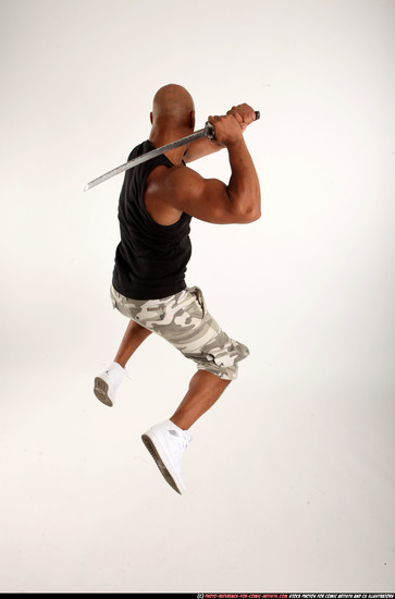 Man Adult Athletic Black Fighting with sword Moving poses Army