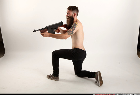 Man Adult Athletic White Fighting with submachine gun Kneeling poses Pants