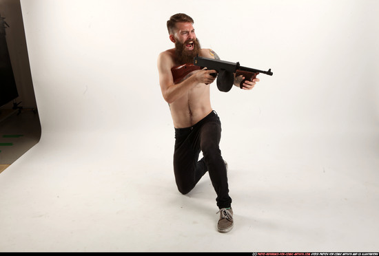 Man Adult Athletic White Fighting with submachine gun Kneeling poses Pants