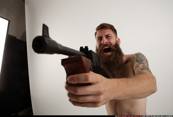 Man Adult Athletic White Fighting with submachine gun Kneeling poses Pants