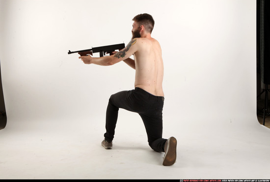 Man Adult Athletic White Fighting with submachine gun Kneeling poses Pants