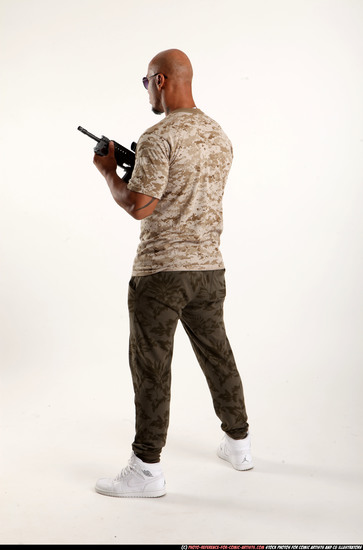 Man Adult Athletic Black Fighting with submachine gun Standing poses Army