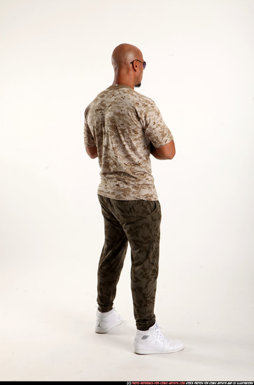 Man Adult Athletic Black Fighting with submachine gun Standing poses Army