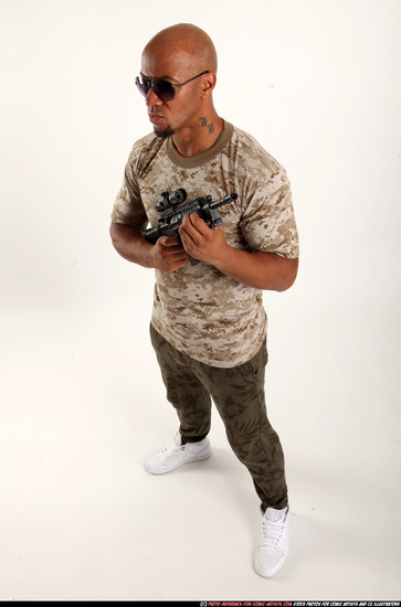 Man Adult Athletic Black Fighting with submachine gun Standing poses Army