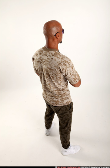 Man Adult Athletic Black Fighting with submachine gun Standing poses Army