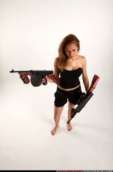 Woman Adult Athletic White Fighting with submachine gun Standing poses Casual