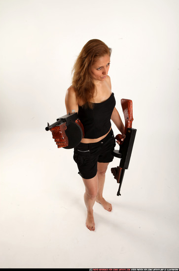 Woman Adult Athletic White Fighting with submachine gun Standing poses Casual