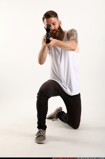 Man Adult Athletic White Fighting with submachine gun Kneeling poses Casual