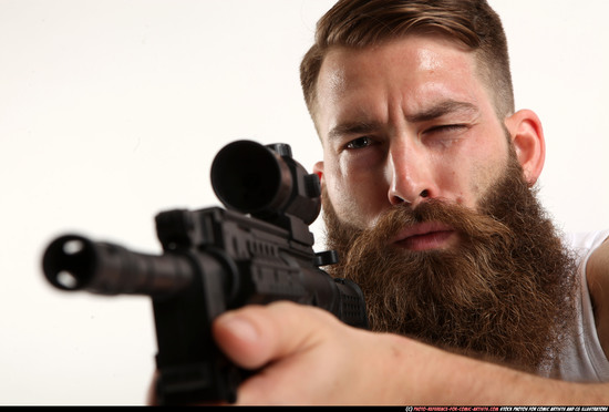 Man Adult Athletic White Fighting with submachine gun Kneeling poses Casual