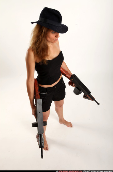 Woman Adult Athletic White Fighting with submachine gun Standing poses Casual