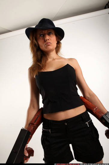 Woman Adult Athletic White Fighting with submachine gun Standing poses Casual