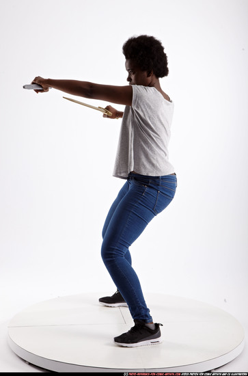 Woman Adult Athletic Black Fighting with sword Standing poses Casual