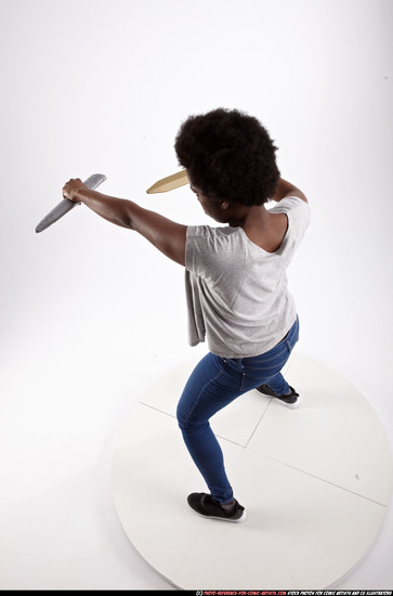 Woman Adult Athletic Black Fighting with sword Standing poses Casual