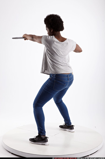 Woman Adult Athletic Black Fighting with sword Standing poses Casual