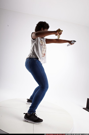 Woman Adult Athletic Black Fighting with sword Standing poses Casual