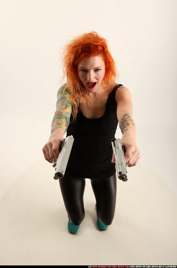 Woman Adult Athletic White Fighting with gun Standing poses Casual