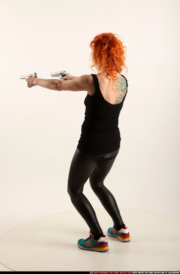 Woman Adult Athletic White Fighting with gun Standing poses Casual