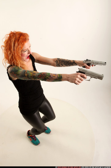 Woman Adult Athletic White Fighting with gun Standing poses Casual