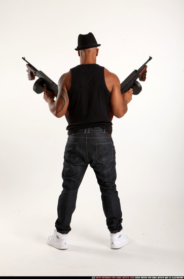 Man Adult Athletic Black Fighting with submachine gun Standing poses Casual