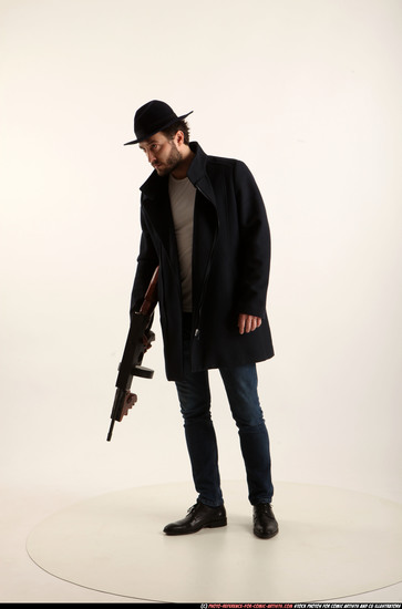 Man Adult Athletic White Fighting with submachine gun Standing poses Coat